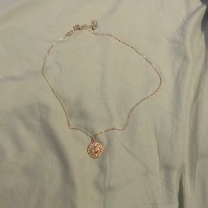 Gold sun necklace